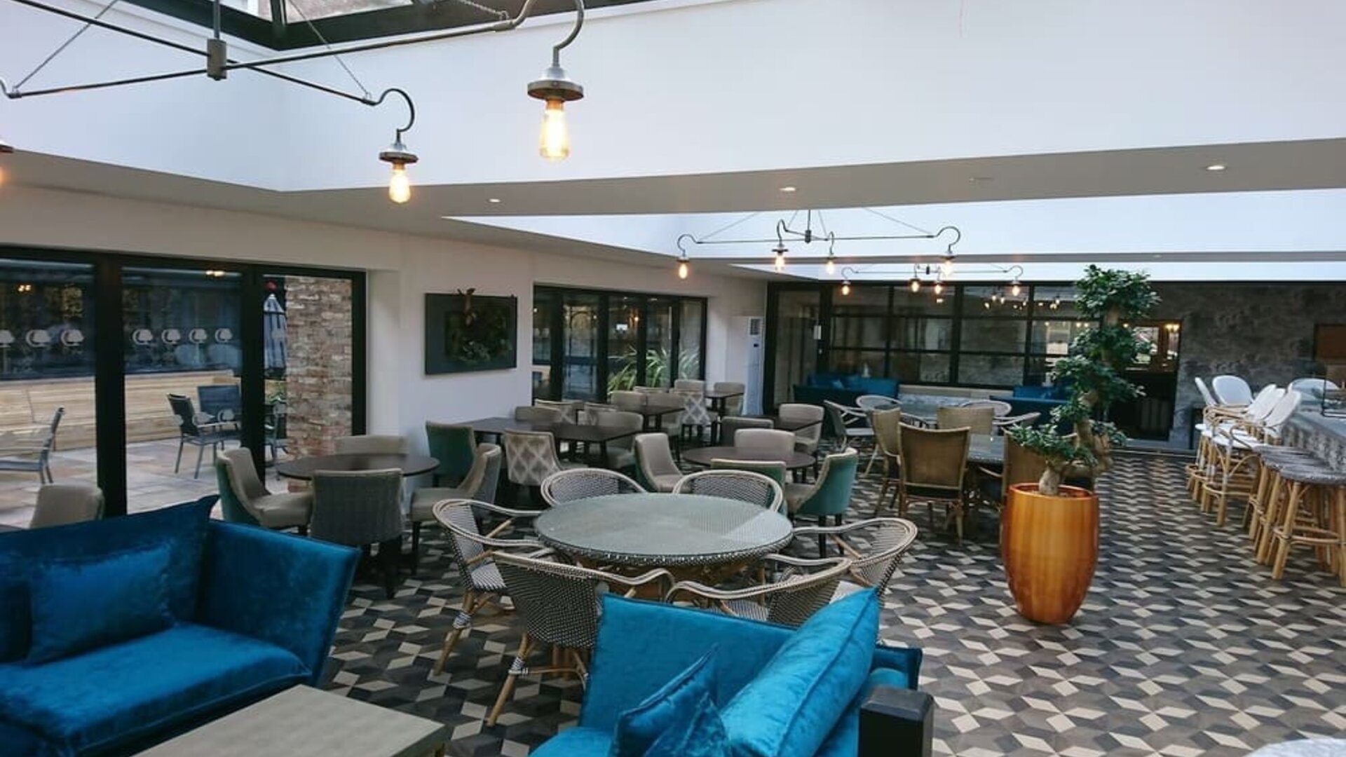 Spacious dining area with natural light at DoubleTree By Hilton York.