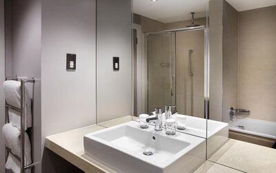 Guest bathroom with shower at Doubletree by Hilton Glasgow Central.