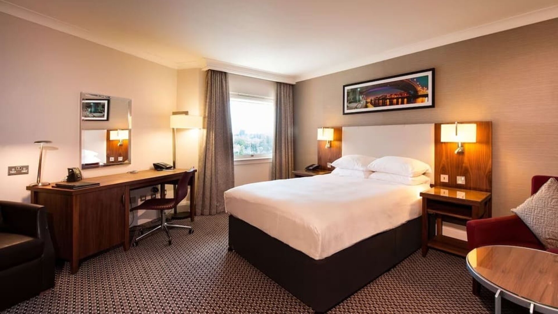 Spacious day use room with work desk at Doubletree by Hilton Glasgow Strathclyde. 