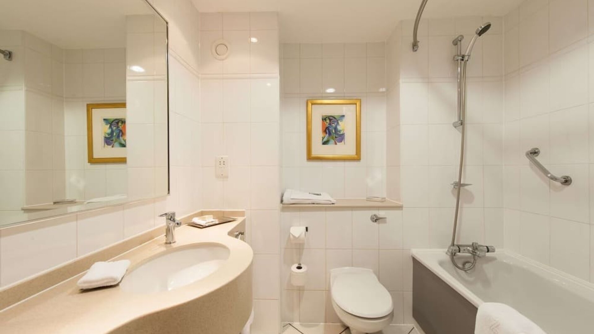 Guest bathroom with shower at Doubletree by Hilton Glasgow Strathclyde. 