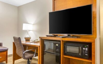TV and work station at Comfort Suites Oakbrook Terrace.