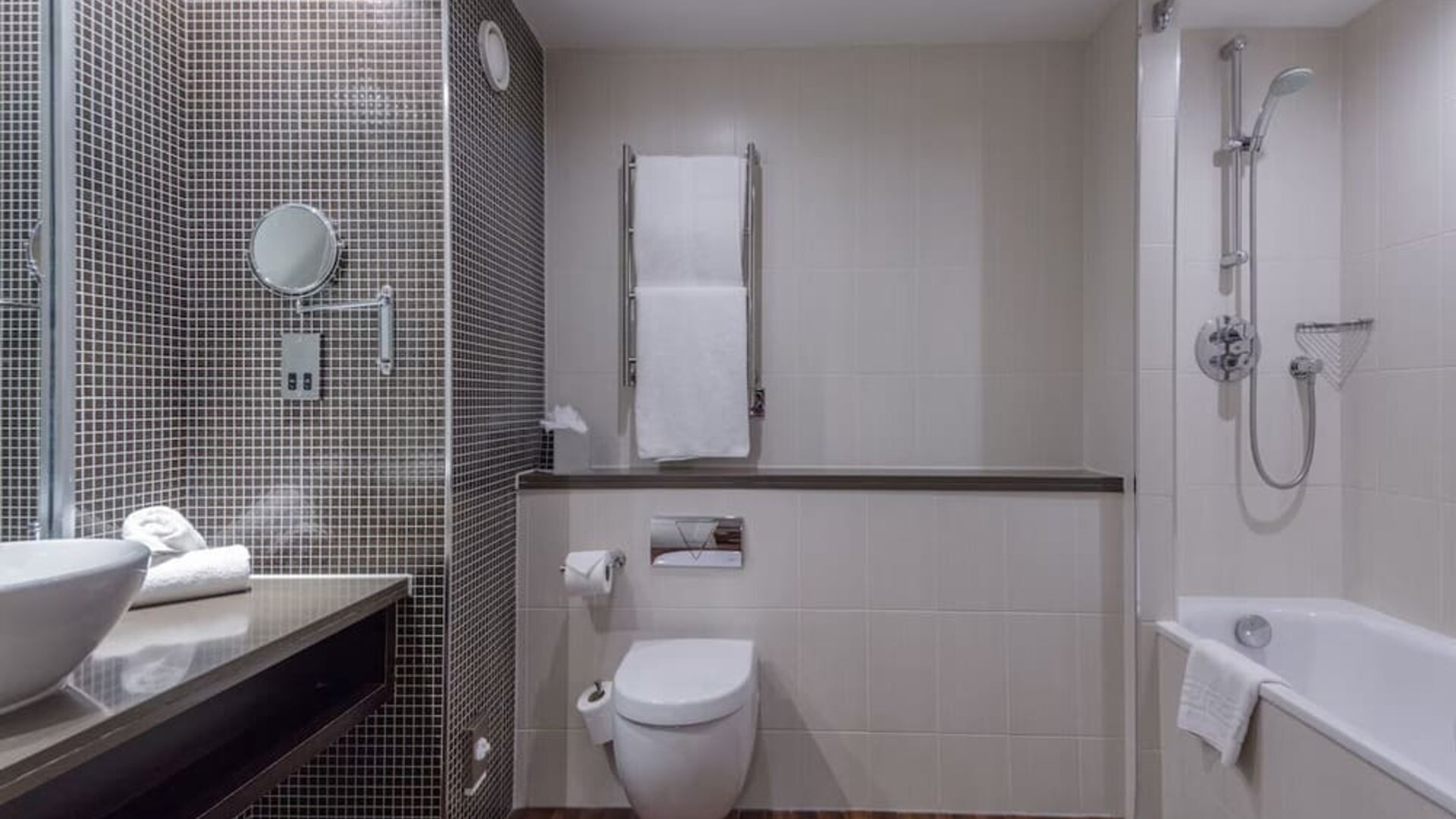 Guest bathroom with shower at DoubleTree By Hilton Stratford-upon-Avon.