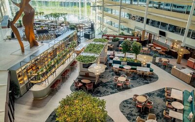Restaurant and bar view from above at Hilton London Heathrow Airport.