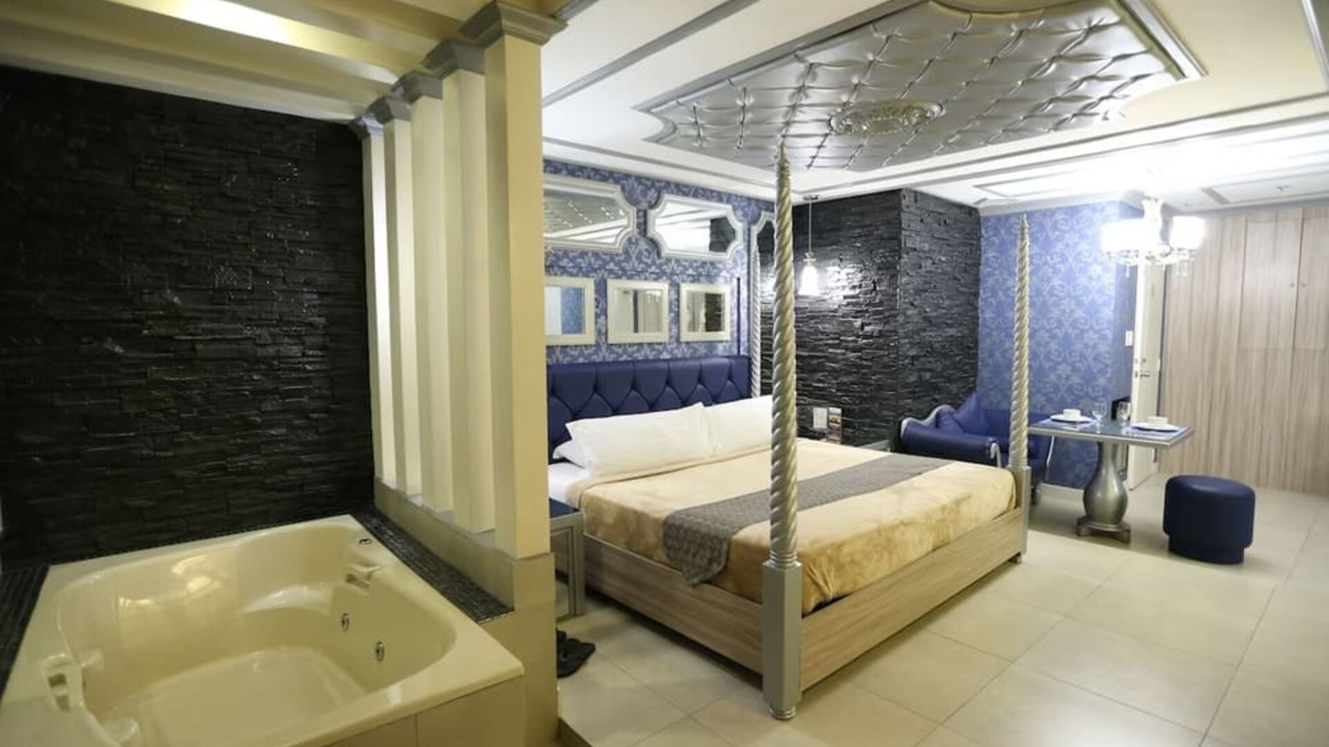 King room with jacuzzi tub at Victoria Court Suites.