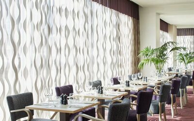 Dining area perfect for coworking at Leonardo Hotel Bradford.
