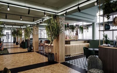 Lobby and coworking lounge at Leonardo Royal Hotel Birmingham.