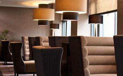 Lobby and coworking lounge at Leonardo Hotel Dublin Christchurch.