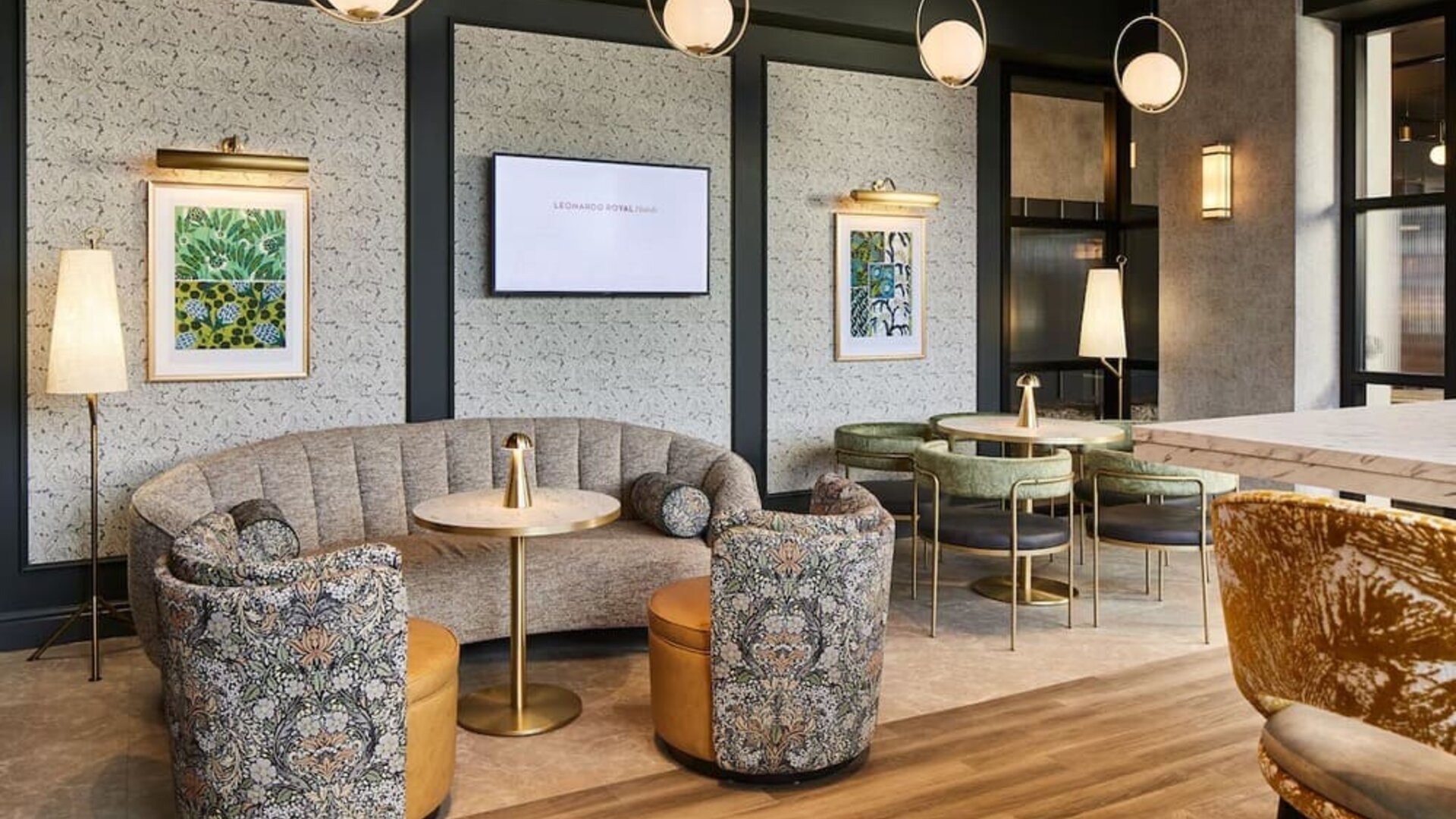 Lobby and coworking lounge at Leonardo Royal Hotel Glasgow.