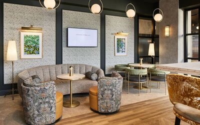 Lobby and coworking lounge at Leonardo Royal Hotel Glasgow.