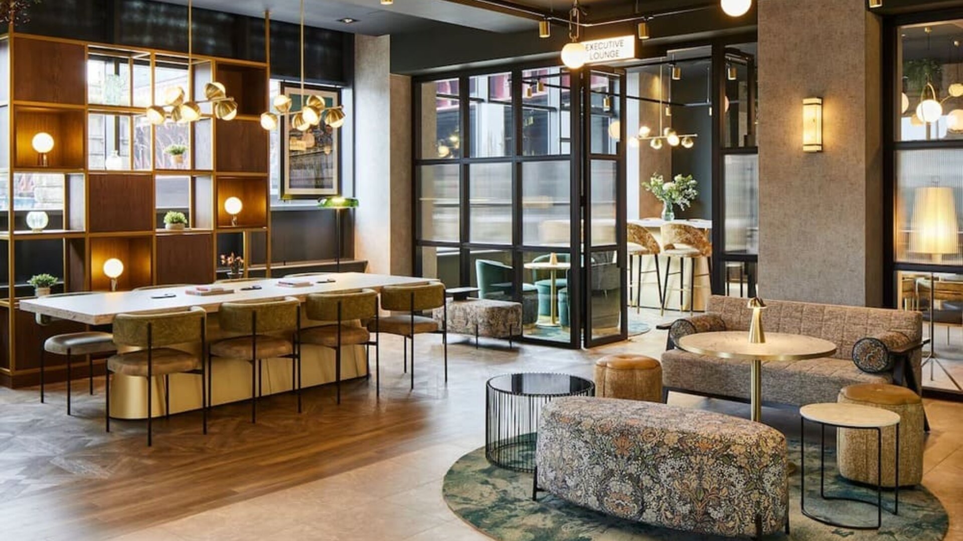 Lobby and coworking lounge at Leonardo Royal Hotel Glasgow.