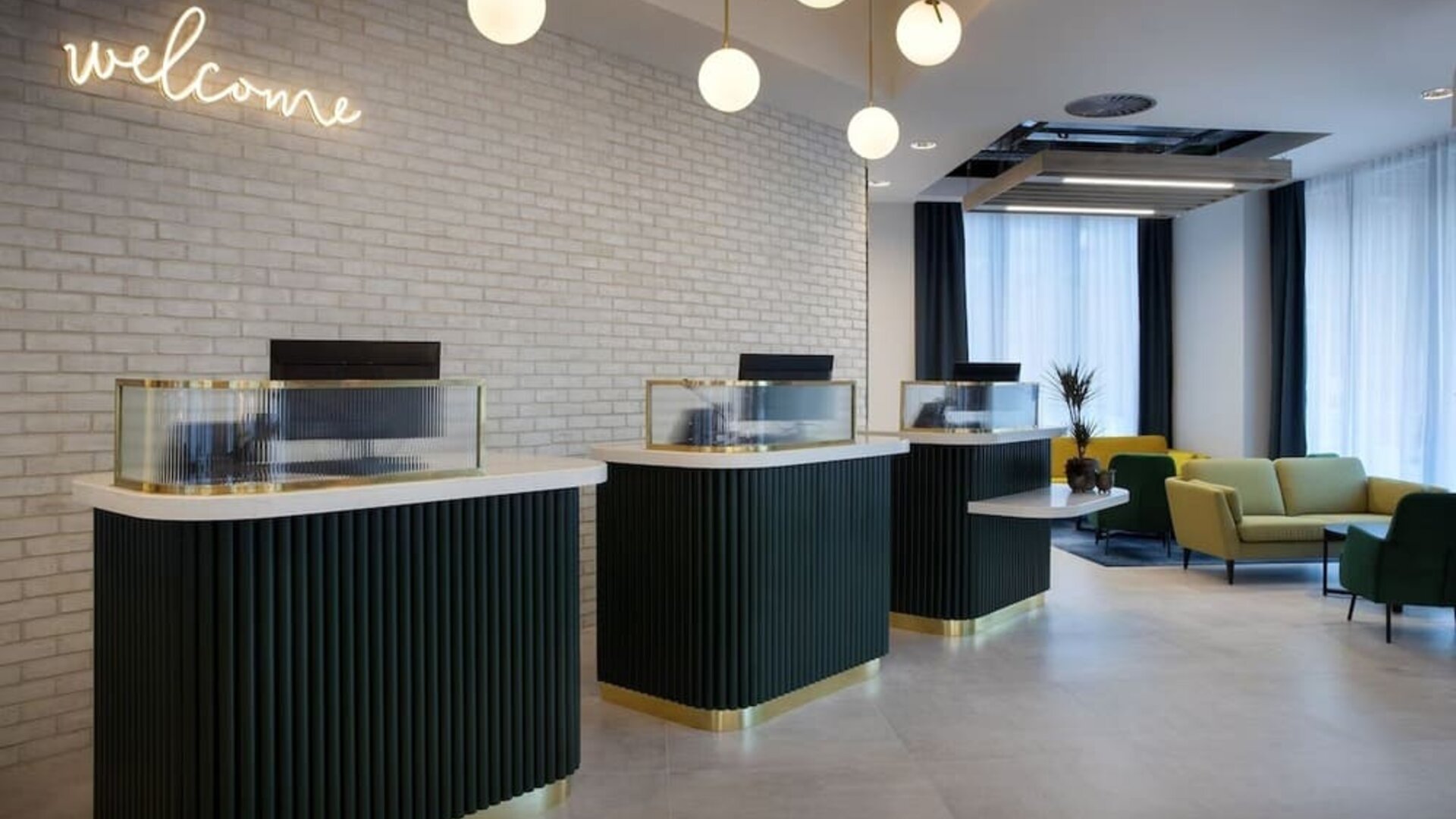 Lobby and coworking lounge at Leonardo Hotel Bristol City.
