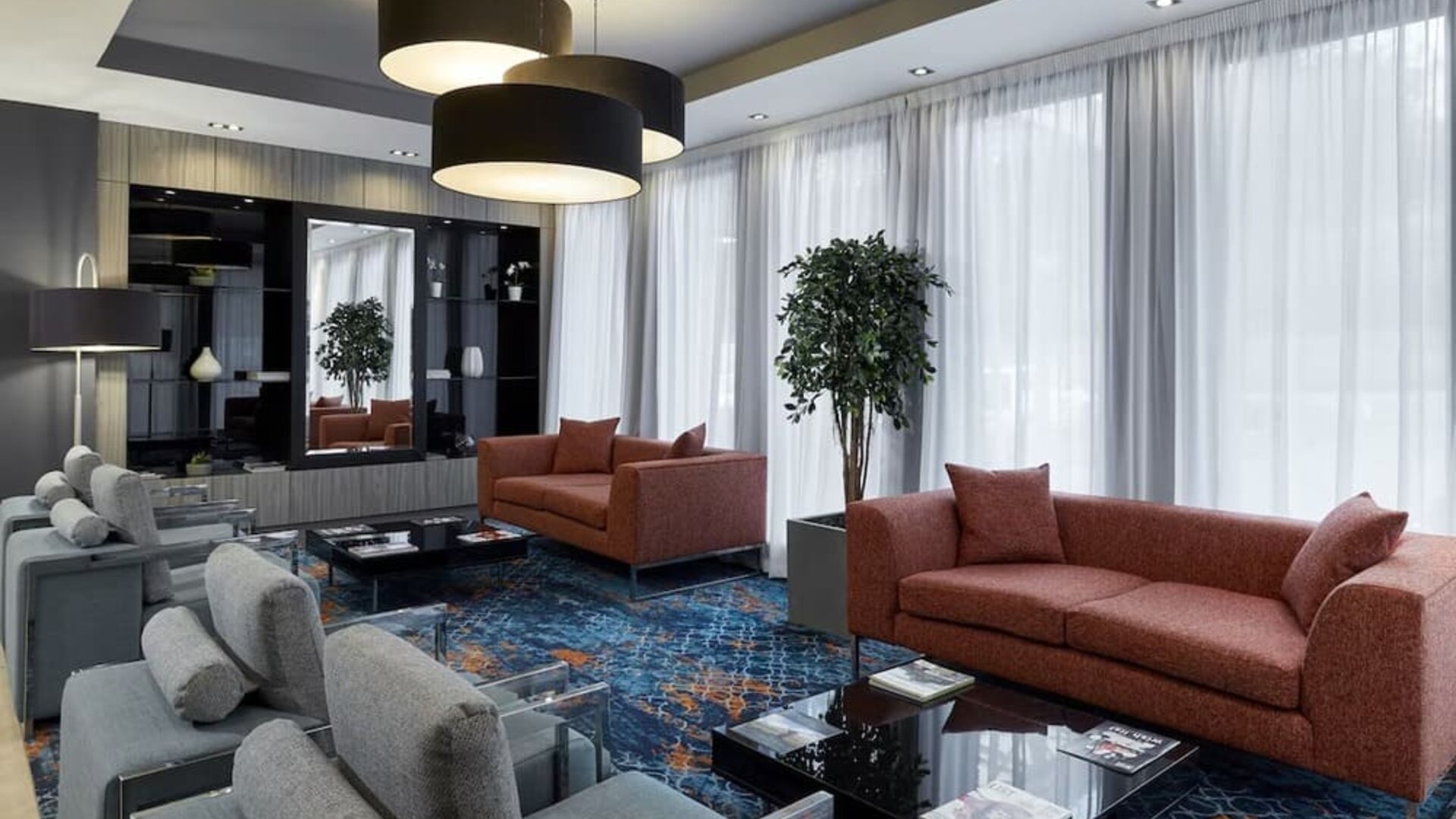 Lobby and coworking lounge at Leonardo Hotel Edinburgh Murrayfield.