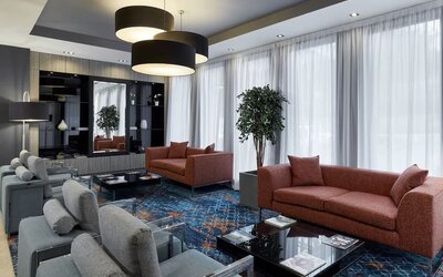 Lobby and coworking lounge at Leonardo Hotel Edinburgh Murrayfield.