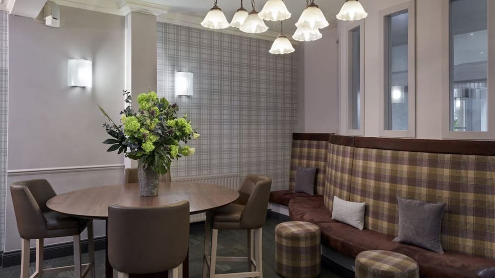 Lobby and coworking lounge at Leonardo Hotel Edinburgh City.