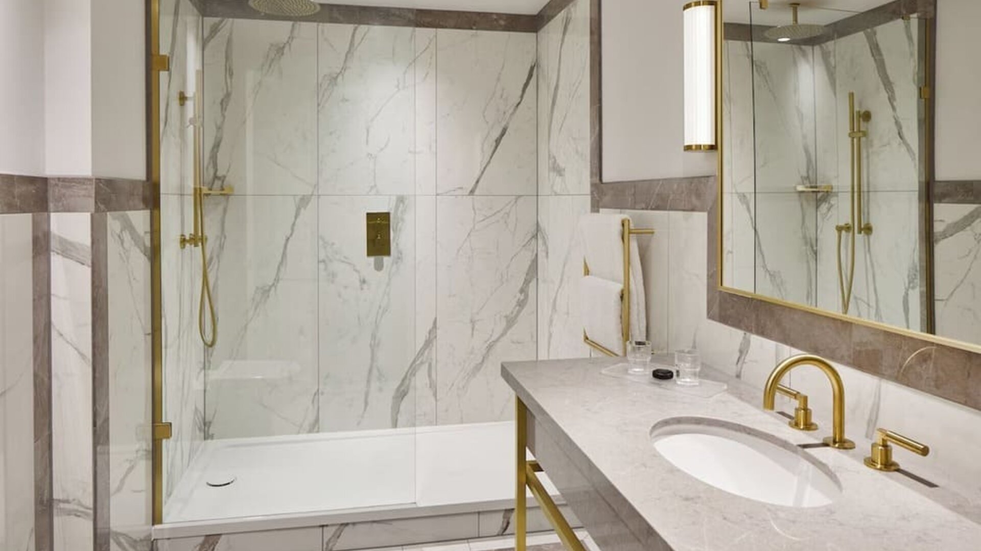 Guest bathroom with shower at The Grand Brighton. 