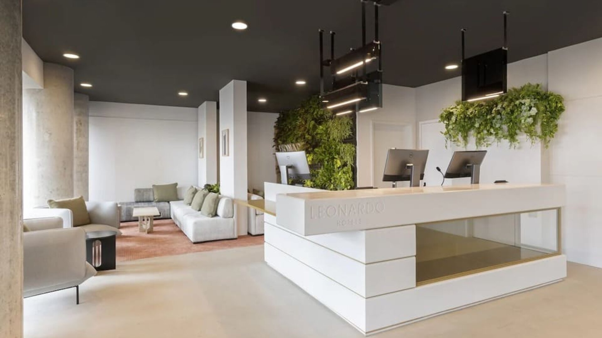 Lobby and coworking lounge at Leonardo Hotel Manchester Piccadilly. 