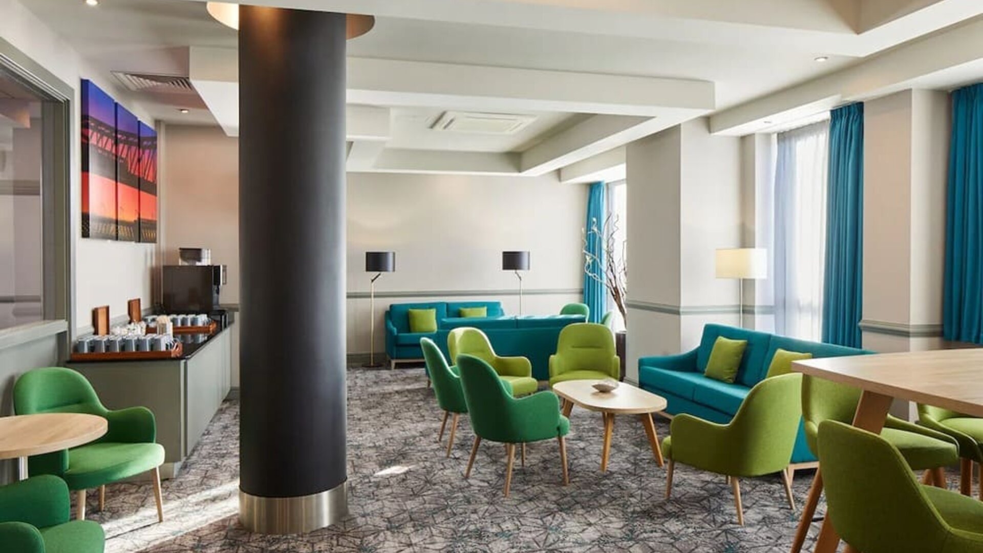 Coworking space and lounge area at Leonardo Hotel Newcastle.