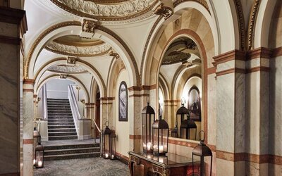 Ornate hotel hallway with arched ceilings and marble accents at The Midland - A Leonardo Royal Hotel.