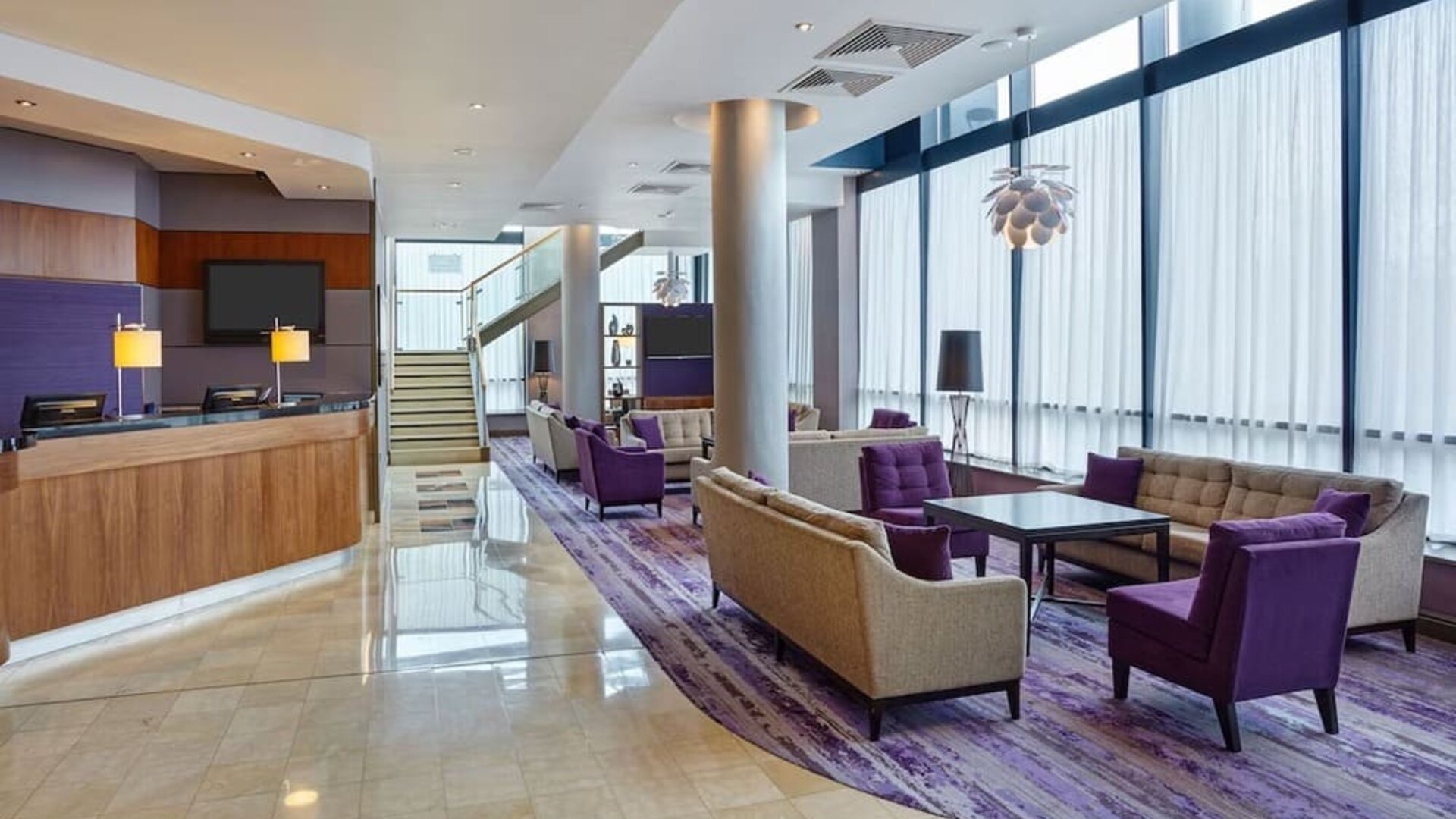 Lobby and coworking lounge at Leonardo Hotel Milton Keynes.