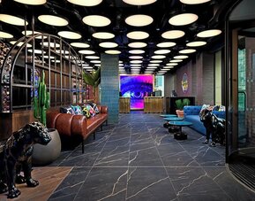 Hotel entrance and lobby at NYX Dublin Portobello.