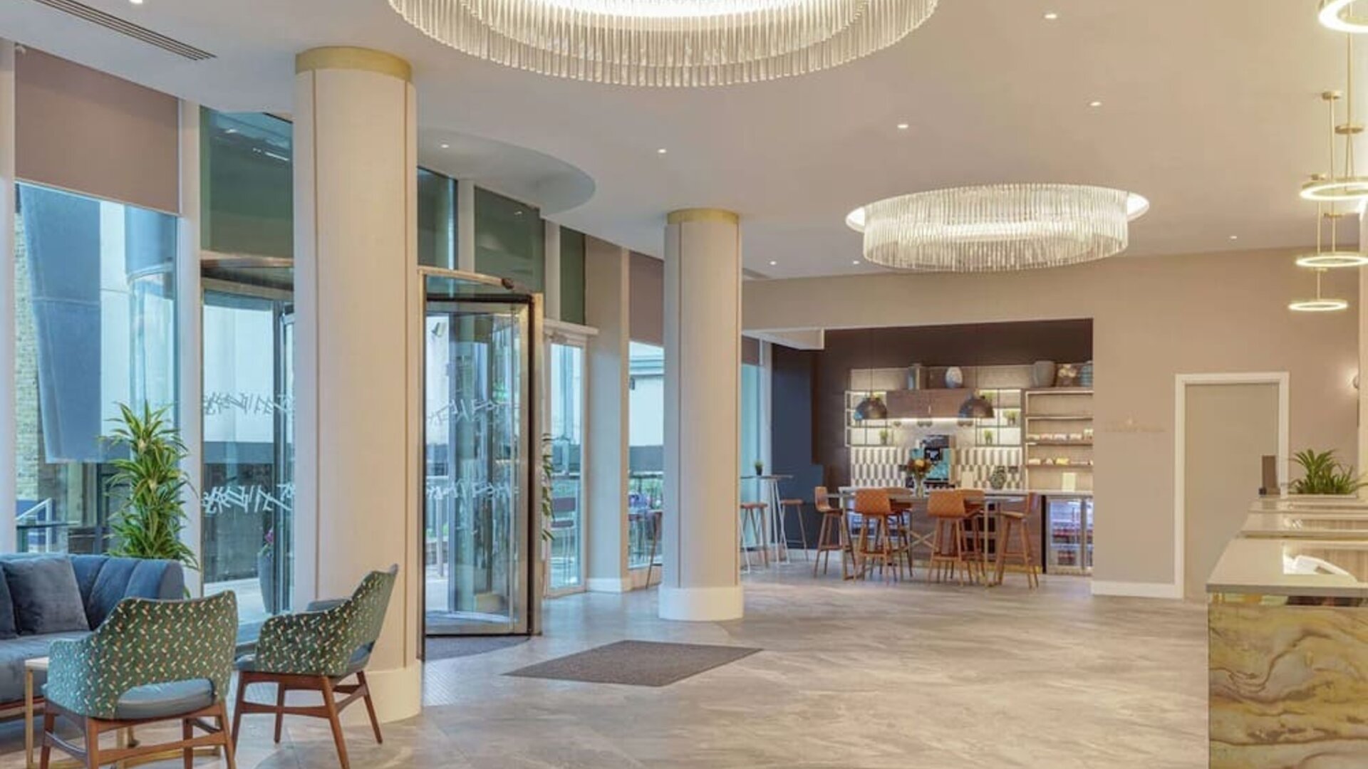 Lobby and coworking lounge at Hilton London Angel Islington.