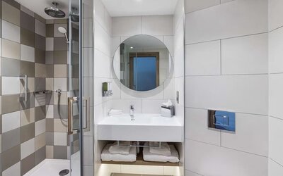 Guest bathroom with shower at Hampton By Hilton Torquay.