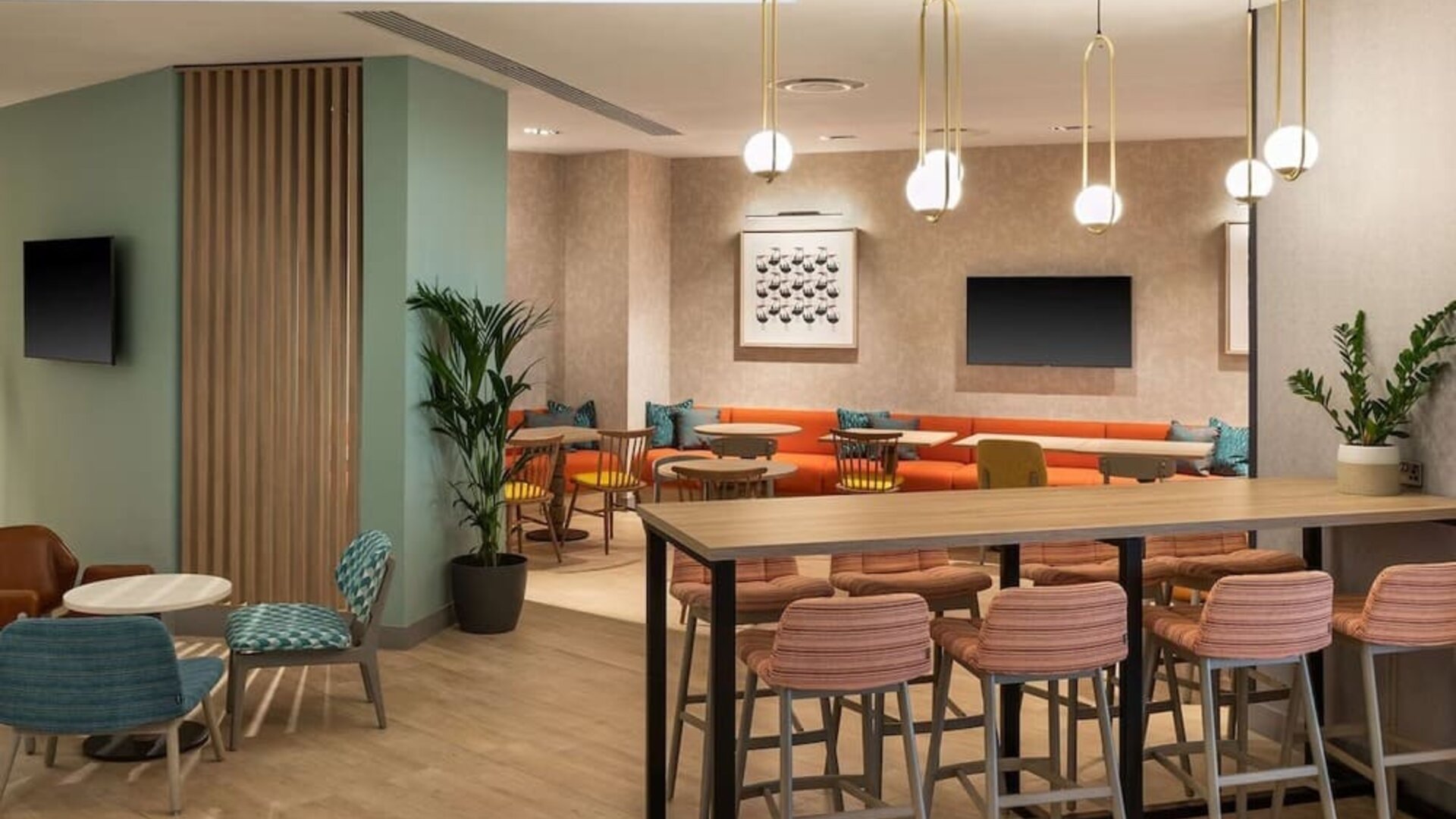 Lobby and coworking lounge at Hampton By Hilton Torquay.