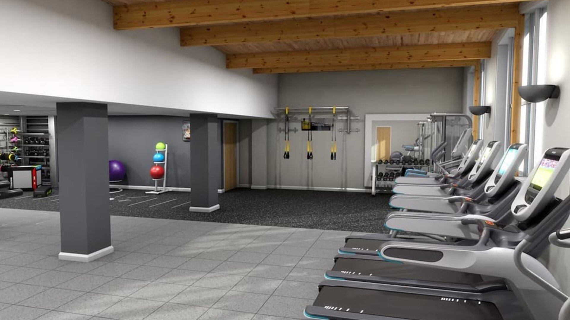 Fitness center with treadmills, machine and equipment at Hilton London Watford.
