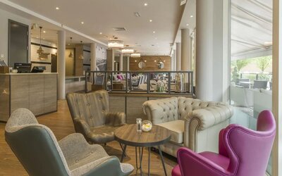 Lobby and coworking lounge at Hilton Garden Inn Bristol City Centre.