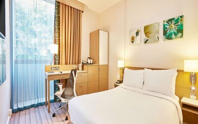 Bright day use room with work desk and TV at the Hilton Garden Inn Birmingham Brindleyplace.