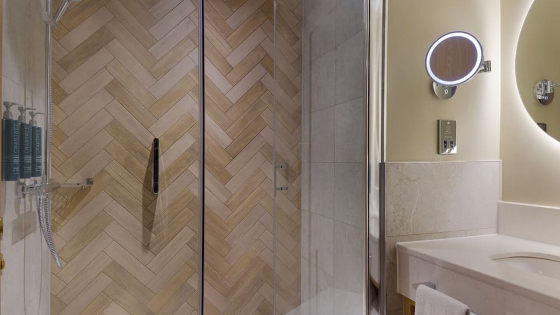 Guest bathroom with shower and toiletries at the DoubleTree by Hilton Bristol North.