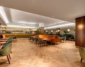 Stylish hotel bar and comfortable lounge area perfect for co-working  at the Hilton Birmingham Metropole.