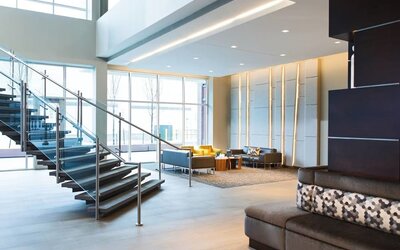 Lobby and coworking lounge at AC Hotel Cincinnati At Liberty Center.