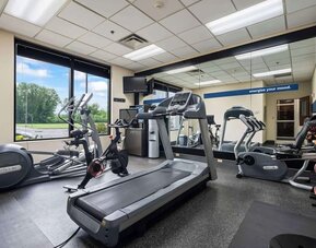 Fitness center featuring cardio equipment, free weights, and modern exercise facilities to help guests stay active during their stay at Hampton Inn Ridgefield Park.