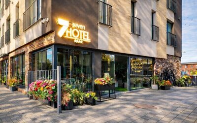 Exterior view of Hotel Seven showcasing its modern architecture and welcoming entrance.