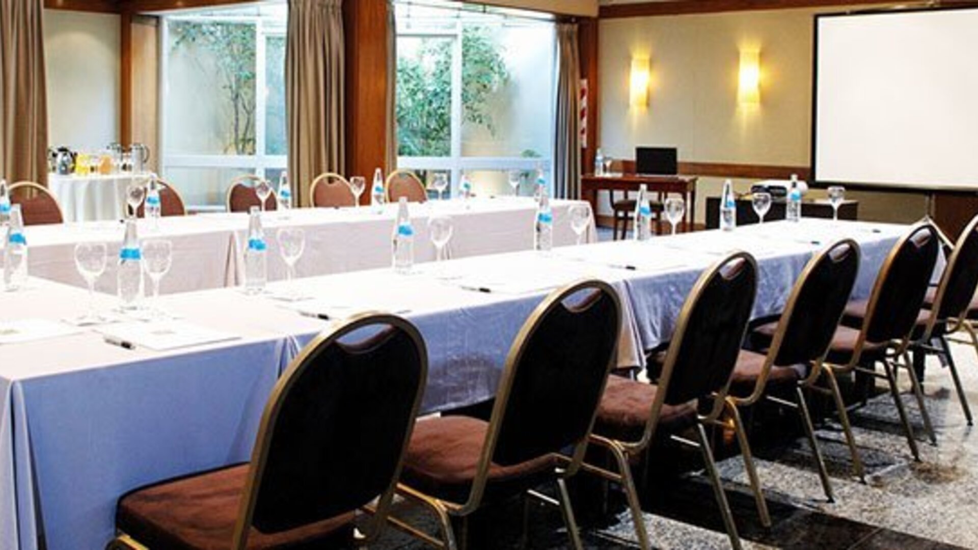Flexible conference and event space configured for presentations, training sessions, corporate meetings, and special events at Hotel Lafayette.