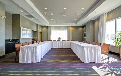 Flexible meeting room arranged in a U-shape for conferences and business events at Fairfield Inn & Suites Guelph.