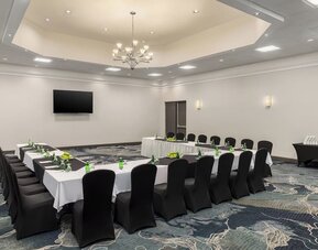 Spacious meeting room configured for conferences, training sessions, and corporate events at Holiday Inn Oakville Centre.