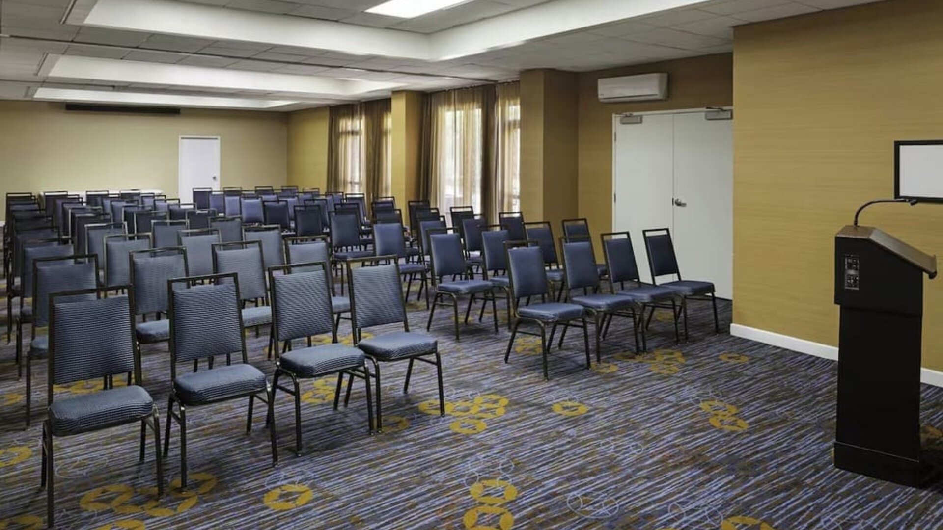 Versatile event space arranged for presentations, seminars, and corporate meetings at Courtyard Riverside UCR/Moreno Valley Area.