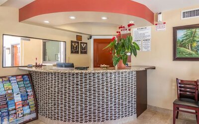 Hotel reception desk at Glenridge Inn Glendale Pasadena.