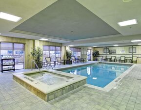 Indoor swimming pool and hot tub at Hampton Inn & Suites By Hilton Guelph.