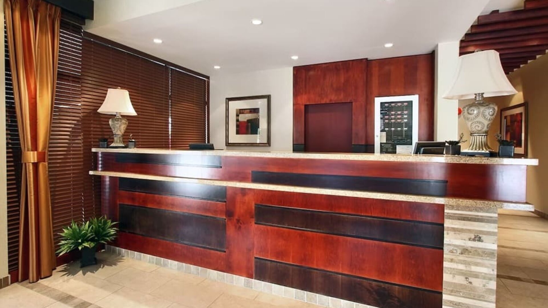 Hotel reception desk at Days Inn Edmonton Downtown.