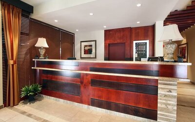 Hotel reception desk at Days Inn Edmonton Downtown.