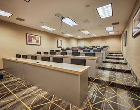 Ballroom event space with banquet seating at Amenida Residences.