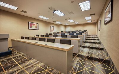 Ballroom event space with banquet seating at Amenida Residences.
