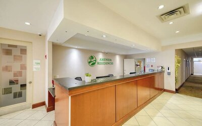 Hotel reception desk at Amenida Residences.