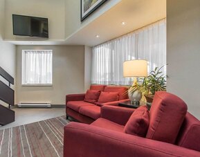 Hotel lobby with business center and reception area at Comfort Inn Val D'Or.
