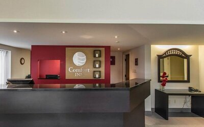 Hotel reception desk at Comfort Inn Val D'Or.