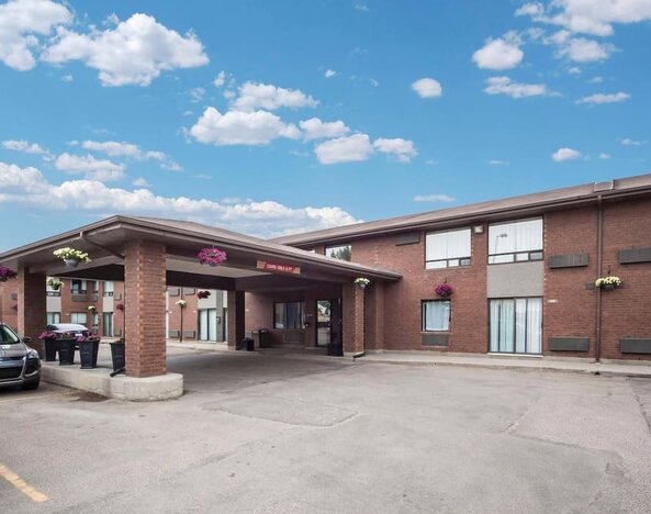 Hotel exterior with covered entrance at Comfort Inn Edmonton West.