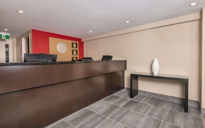 Hotel reception desk at Comfort Inn Ottawa East.